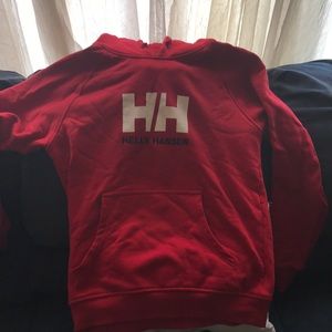 All red Helly Hansen sweater